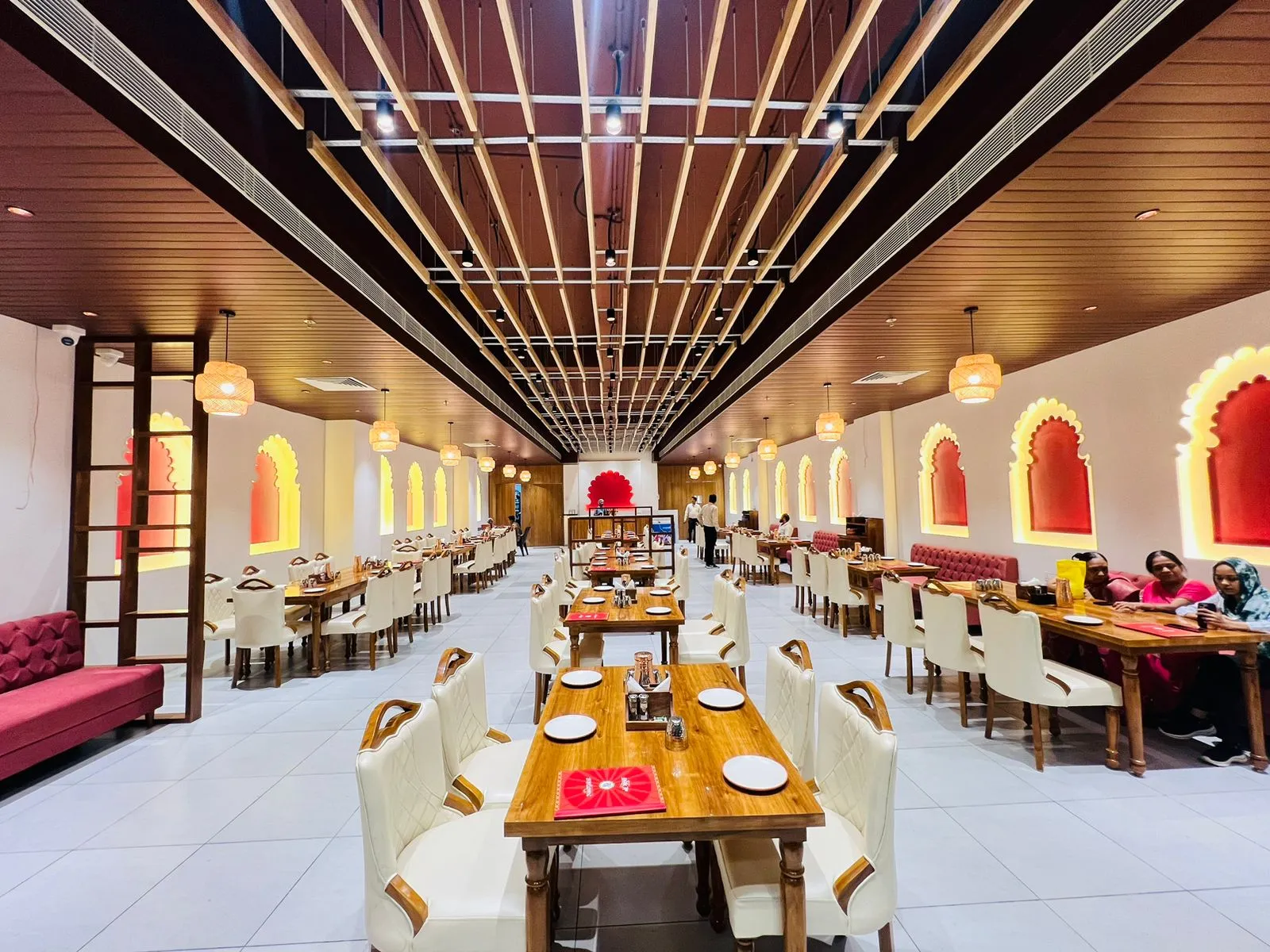 Tables laid with thalis